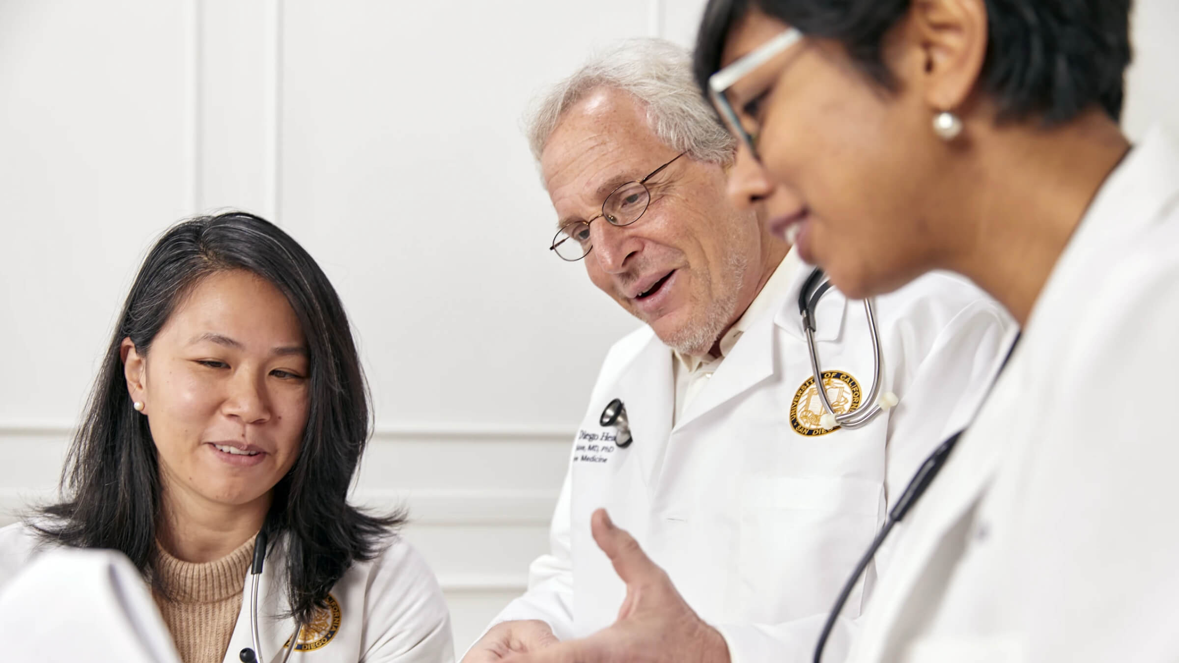 Integrative medicine providers collaborating during a patient care discussion at UC San Diego Health